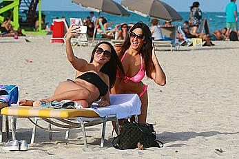 Claudia Romani and Elisa Scheffler in bikini at Miami beach