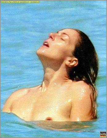 Italian actress and showgirl Claudia Gerini topless in a sea