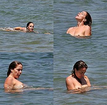 Italian actress and showgirl Claudia Gerini topless in a sea