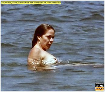 Italian actress and showgirl Claudia Gerini topless in a sea