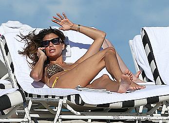 Claudia Galanti cleavage in bikini candids