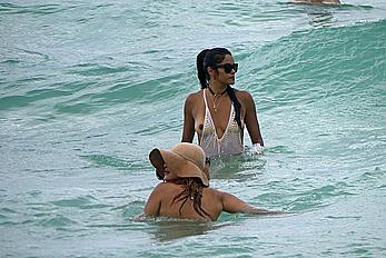 Claudia Jordan tit slip and see through in wet swimsuit