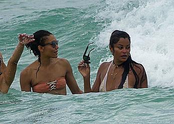 Claudia Jordan tit slip and see through in wet swimsuit