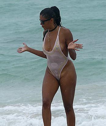 Claudia Jordan tit slip and see through in wet swimsuit