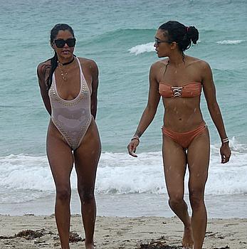 Claudia Jordan tit slip and see through in wet swimsuit