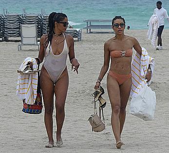 Claudia Jordan tit slip and see through in wet swimsuit