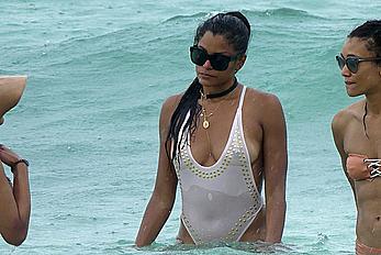 Claudia Jordan tit slip and see through in wet swimsuit