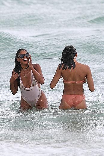 Claudia Jordan tit slip and see through in wet swimsuit