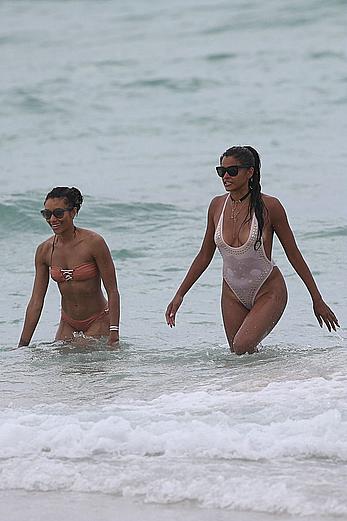 Claudia Jordan tit slip and see through in wet swimsuit