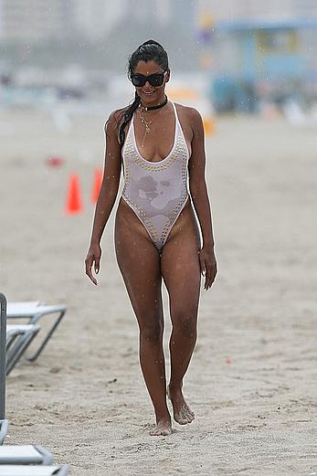 Claudia Jordan tit slip and see through in wet swimsuit