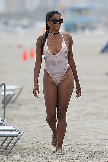 Claudia Jordan tit slip and see through in wet swimsuit