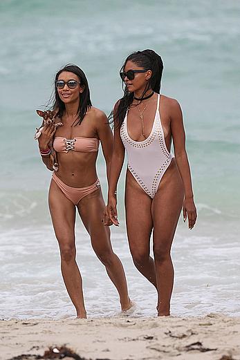 Claudia Jordan tit slip and see through in wet swimsuit