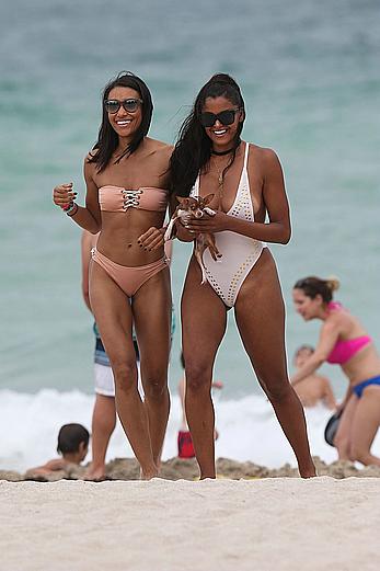 Claudia Jordan tit slip and see through in wet swimsuit