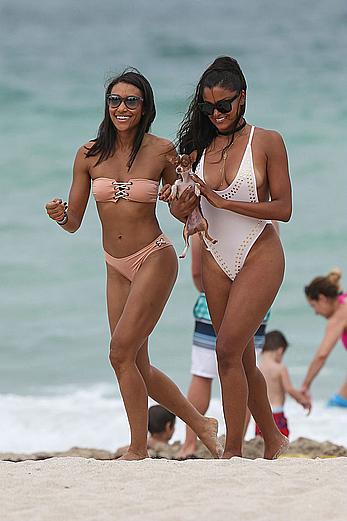 Claudia Jordan tit slip and see through in wet swimsuit