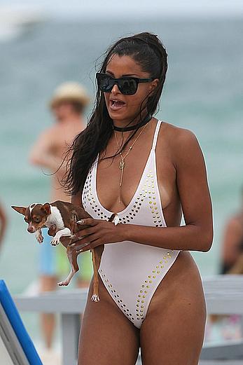 Claudia Jordan tit slip and see through in wet swimsuit