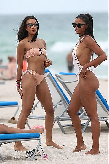 Claudia Jordan tit slip and see through in wet swimsuit