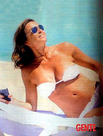 Cristina Parodi sunbathing topless in Formentera