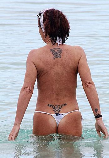 Danniella Westbrook topless on a beach in Spain