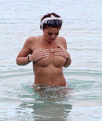 Danniella Westbrook topless on a beach in Spain