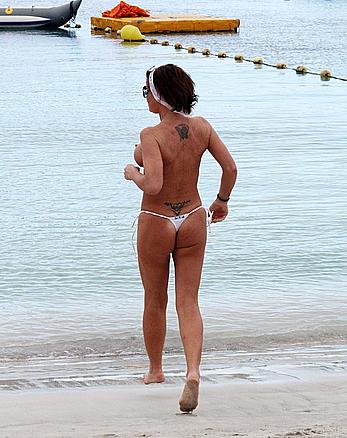 Danniella Westbrook topless on a beach in Spain