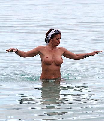 Danniella Westbrook topless on a beach in Spain