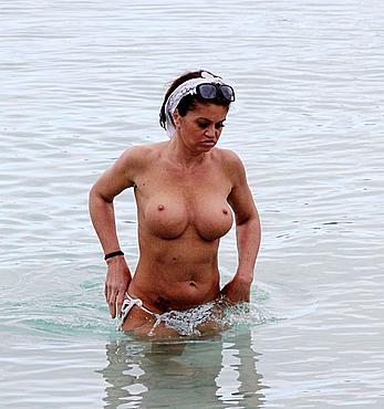 Danniella Westbrook topless on a beach in Spain