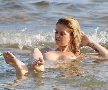 Danniella Westbrook topless in the sea in Spain