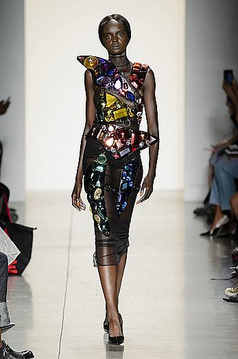 Duckie Thot see through dtressed at during Jeremy Scott Spring 2018 fashion show at New York Fashion Week