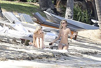 Edita Vilkeviciute sunbathing topless in St Barts