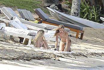 Edita Vilkeviciute sunbathing topless in St Barts