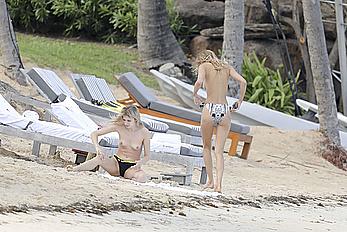 Edita Vilkeviciute sunbathing topless in St Barts