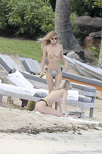 Edita Vilkeviciute sunbathing topless in St Barts