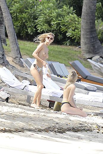 Edita Vilkeviciute sunbathing topless in St Barts