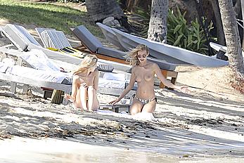 Edita Vilkeviciute sunbathing topless in St Barts