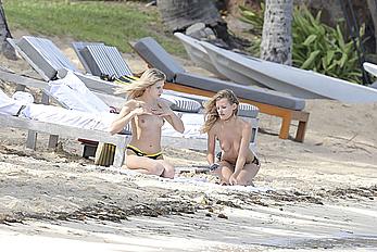 Edita Vilkeviciute sunbathing topless in St Barts