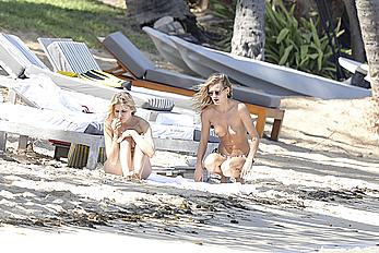 Edita Vilkeviciute sunbathing topless in St Barts