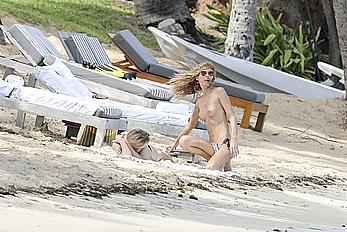 Edita Vilkeviciute sunbathing topless in St Barts