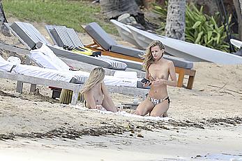 Edita Vilkeviciute sunbathing topless in St Barts