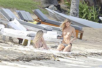 Edita Vilkeviciute sunbathing topless in St Barts