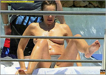 Italian actress Elena Sofia Ricci sunbathing topless paparazzi photos