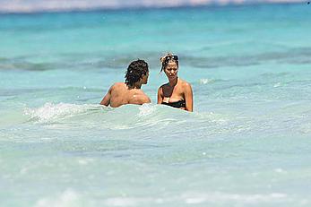 Elena Santarelli topless on the beach candids