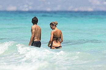 Elena Santarelli topless on the beach candids