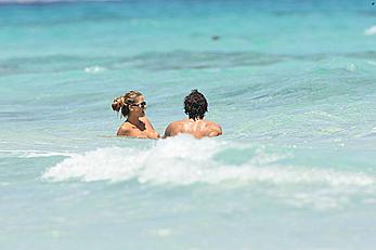 Elena Santarelli topless on the beach candids