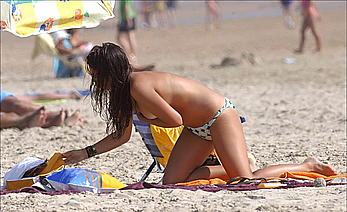 Elena Furiase in bikini and topless on a beach paparazzi photos