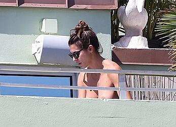 Elisabetta Canalis topless at on a balkony in Miami