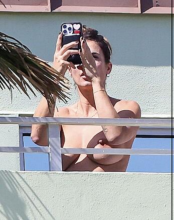 Elisabetta Canalis topless at on a balkony in Miami