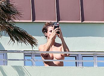 Elisabetta Canalis topless at on a balkony in Miami