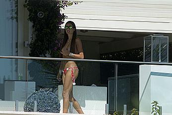 Elisabetta Gregoraci caught topless on a balcony in Porto Cervo