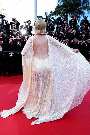 Elle Fanning in see through dress at closing ceremony red carpet of the 77th annual Cannes Film Festival