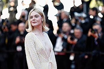 Elle Fanning in see through dress at closing ceremony red carpet of the 77th annual Cannes Film Festival